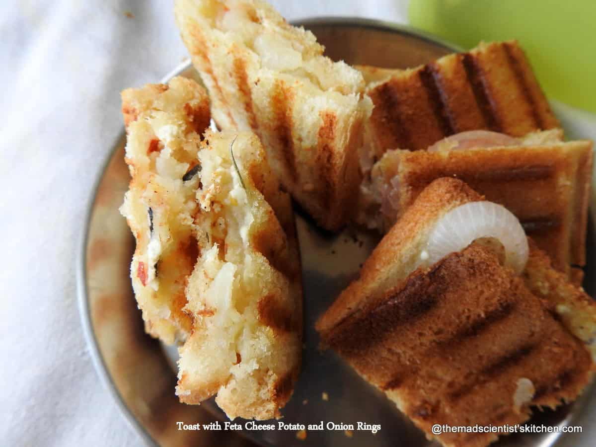 a toast to toast with feta cheese potato and onion rings