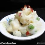 Cauliflower and Peas in Cheese Sauce