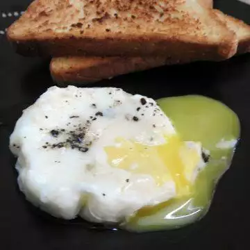 Eggs cooked in simmering water