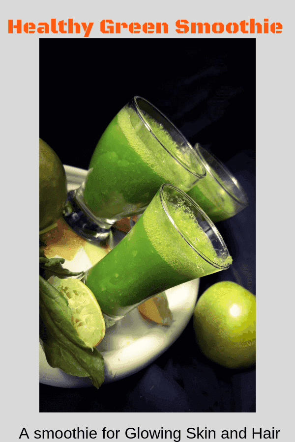 A green smoothie served with ice