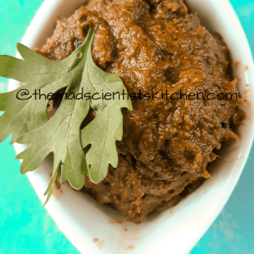 A small ball of the yummy relish/thokku made from coriander leaves, black gram and other spices