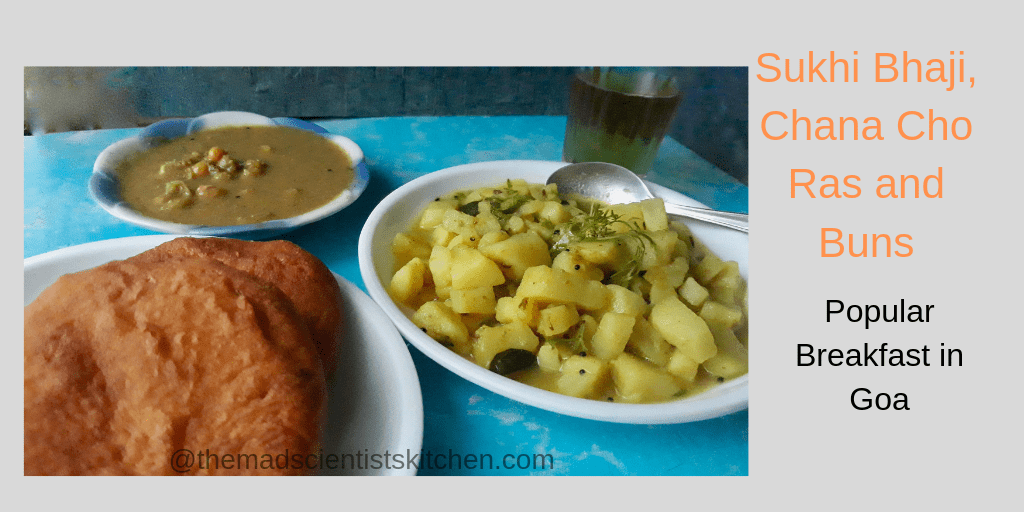 A typical breakfast Sukhi Bhaji, Chana cho Ras and Buns