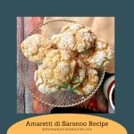 A plate of Amaretti Cookies taste delicious with their delicate almond flavour and crinkled appearance is highlighted by powdered sugar.