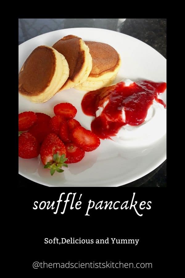 Pancakes with whipped cream, compote and strawberries