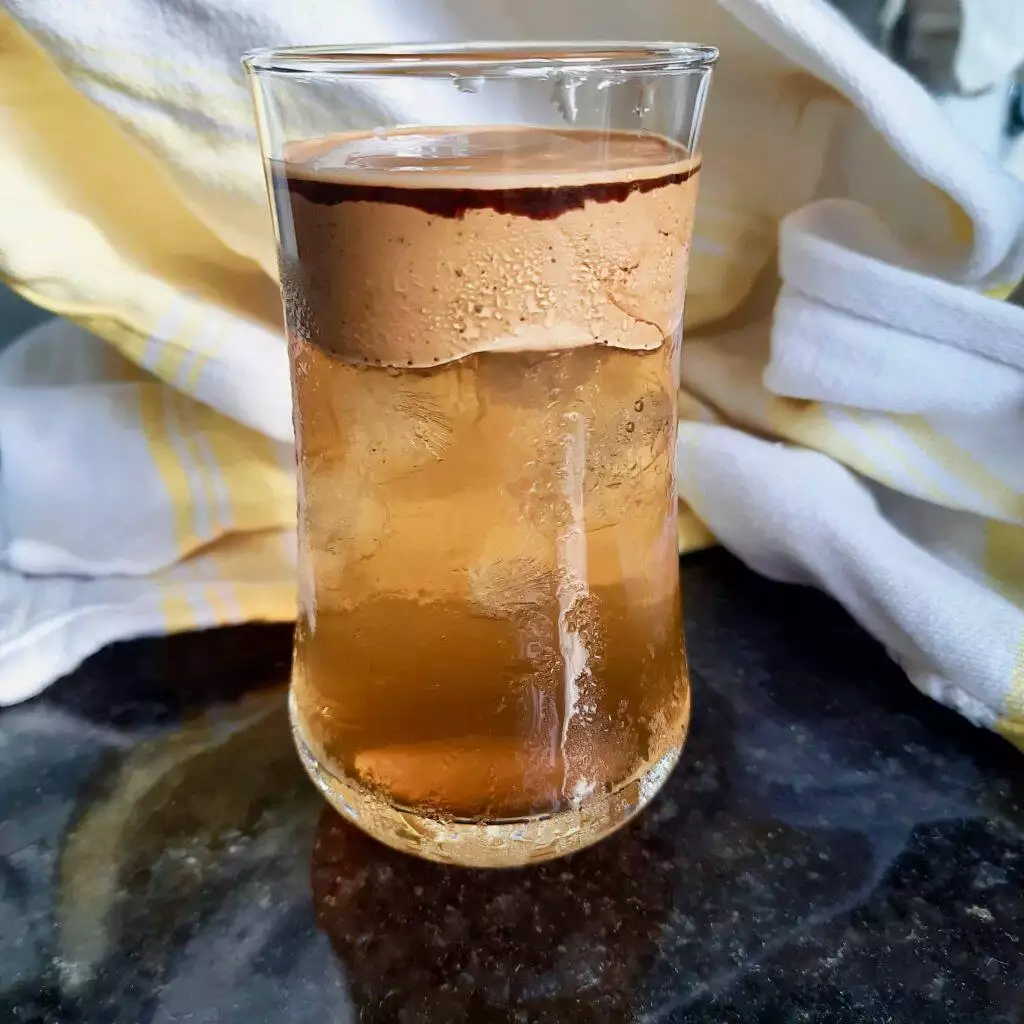 Dalgona Coffee served in water.