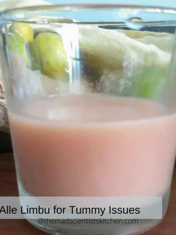 A glass of ginger lemon concentrate.