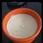 Homemade Indian Yogurt in an orange bowl.