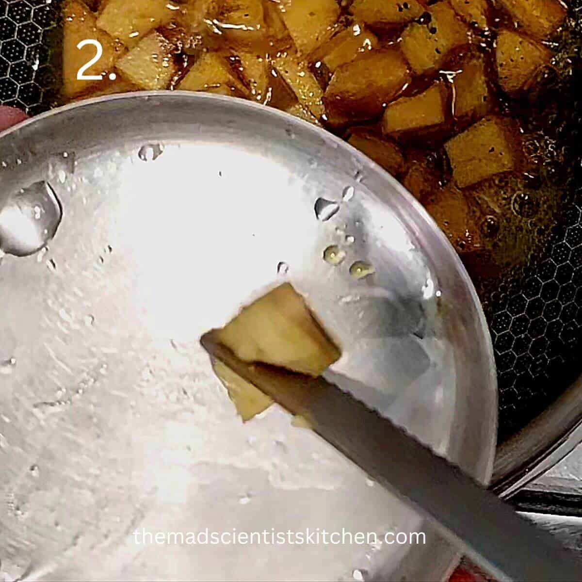 Checking if the yam is well cooked. You should be able to cut it with a knife