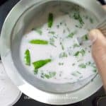 Add chopped coriander leaves to sol kadhi.