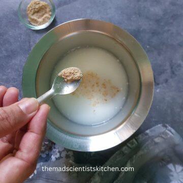 Adding some asafoetida to our Chaach