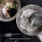 Add some lukewarm water to fresh coconut.