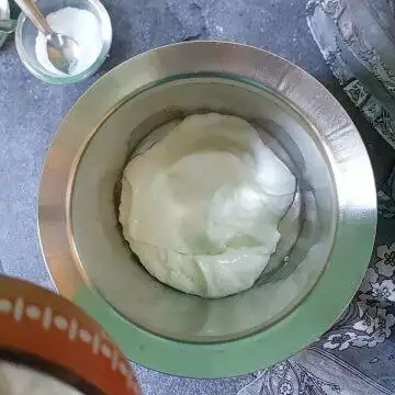 Adding yogurt to make Mattha