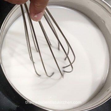 whisking to make a smooth buttermilk