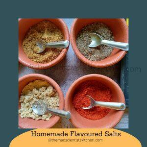 4 of the regular flavored salts on my table cumin salt, salt and pepper, cayenne salt and garlic salt.
