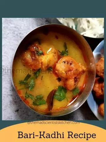 kadhi Bari, a close up of the delicious tangy yogurt curry with soft fried fitters that soak up all the goodness of the Kadhi.