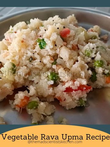 Perfectly cooked Vegetable Upma – light, flavourful, and packed with veggies, served in a steel plate for a cozy breakfast.